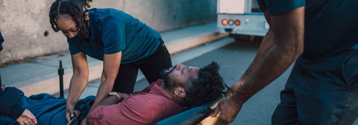 EMS team transporting a patient