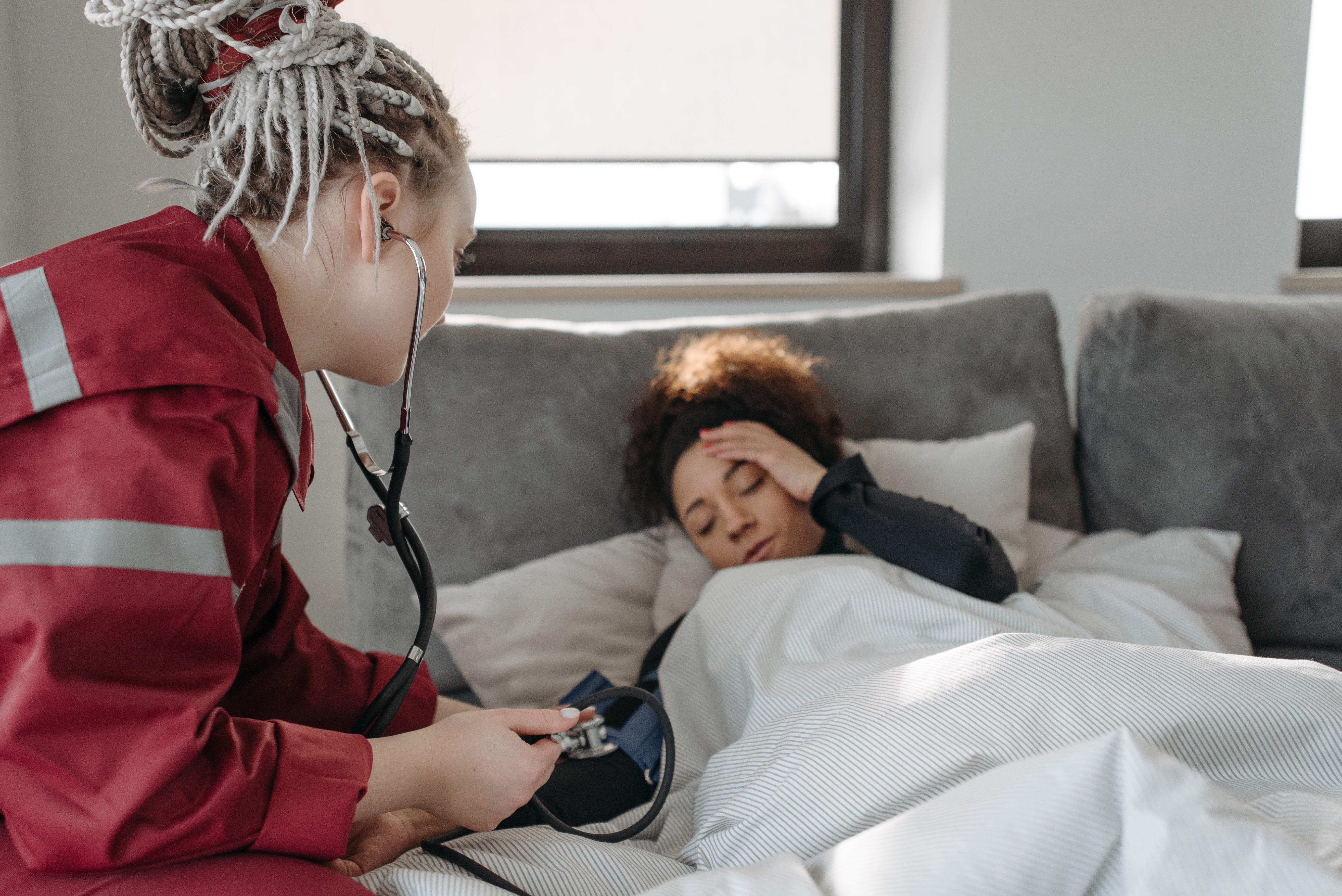 Paramedic attending to a female patient