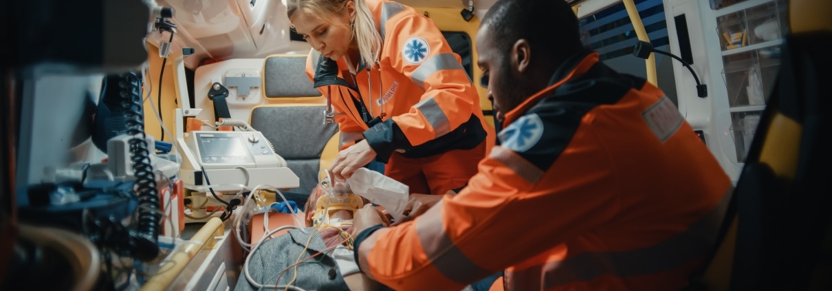 Paramedics at work in an ambulance