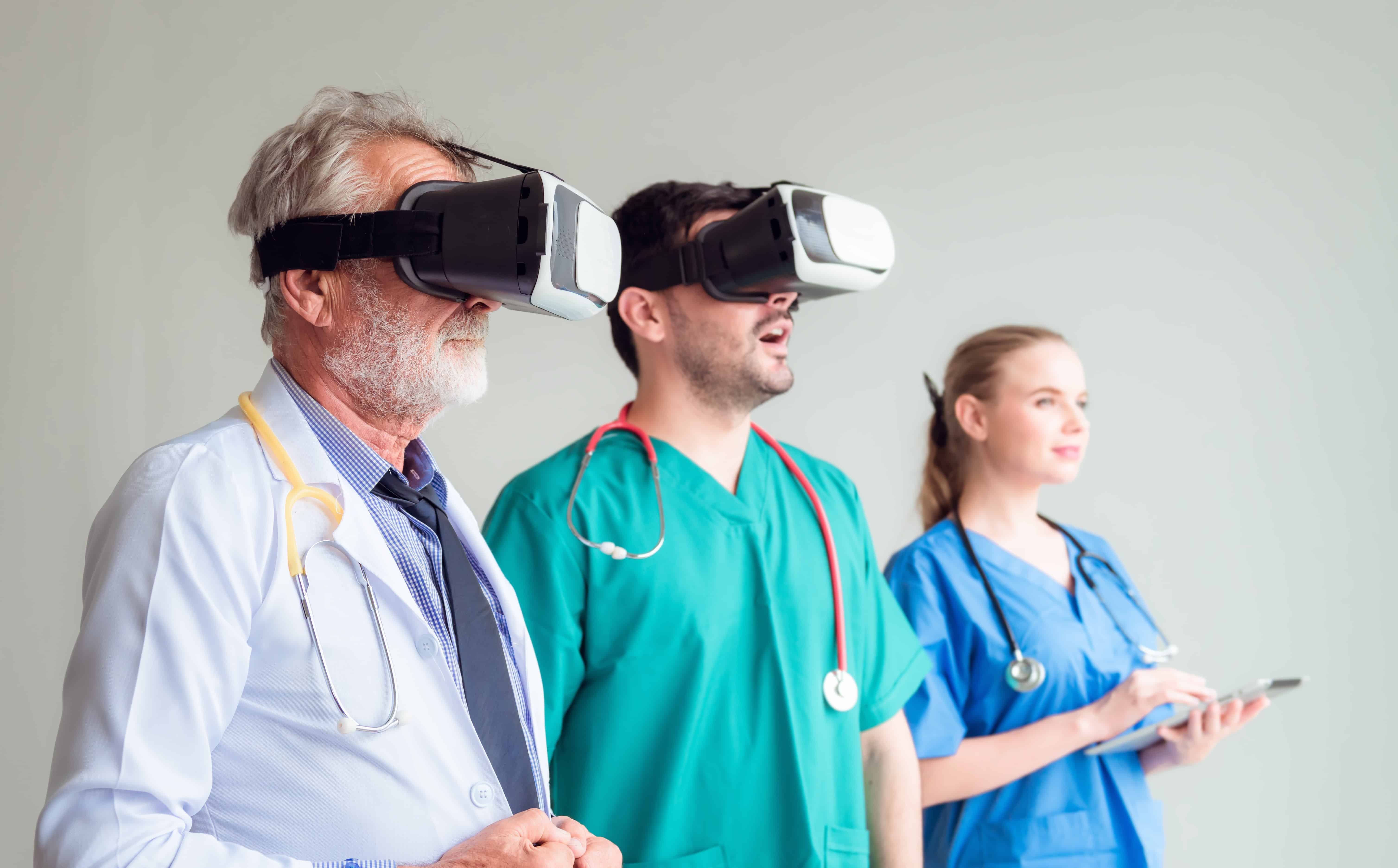 Healthcare team using virtual reality simulation goggles