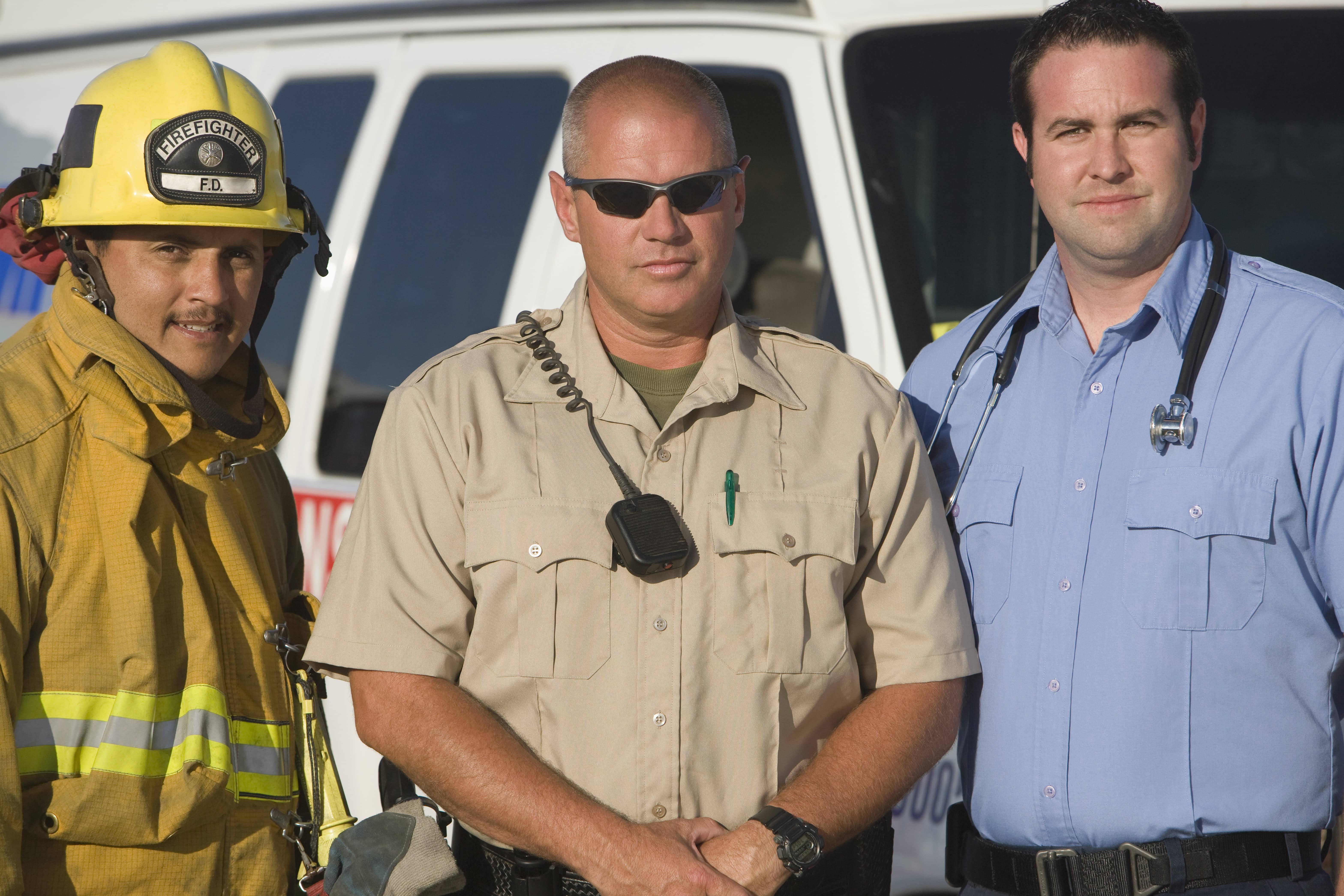 Three Emergency Medical Professionals standing together