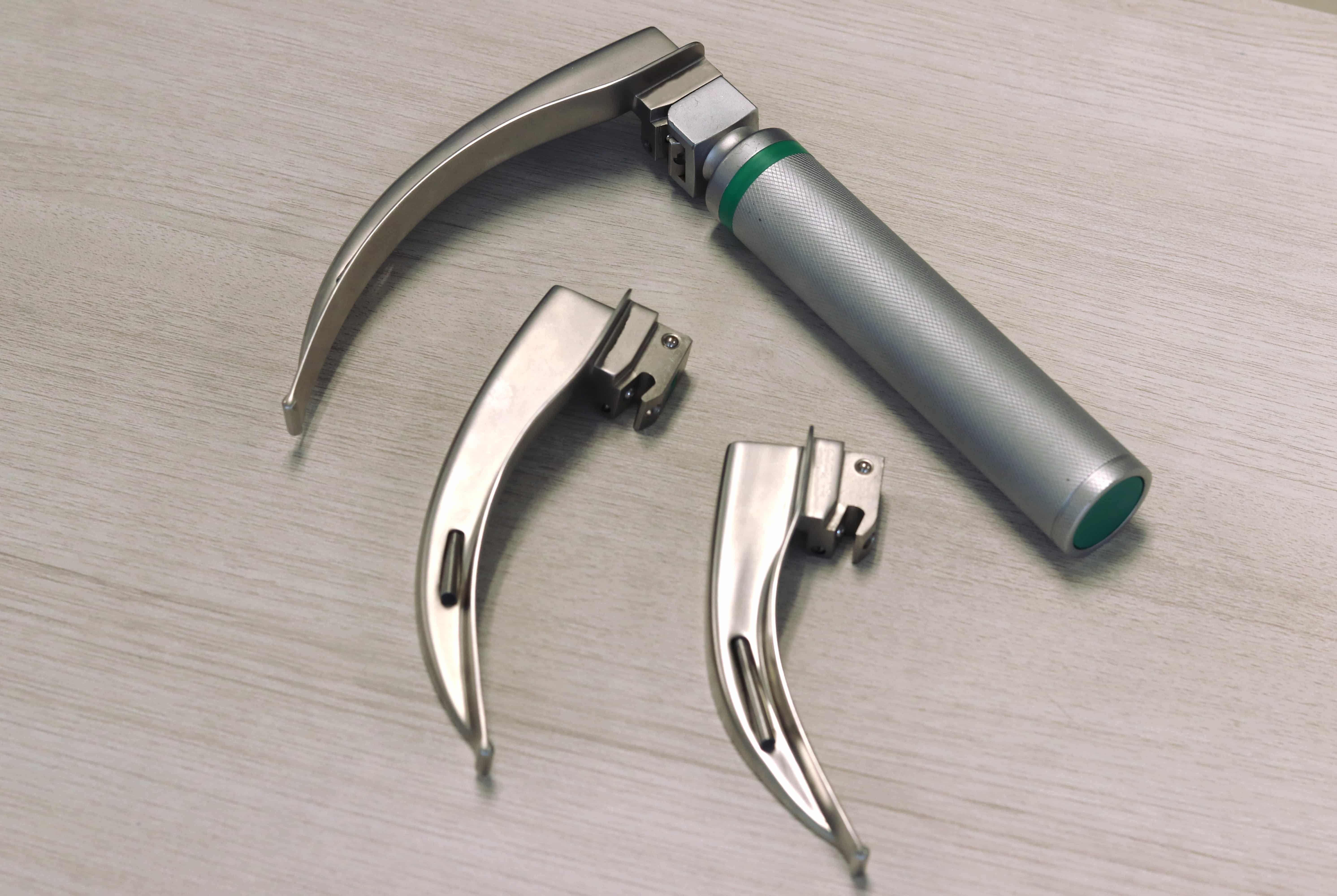 A laryngoscope with different sized blades