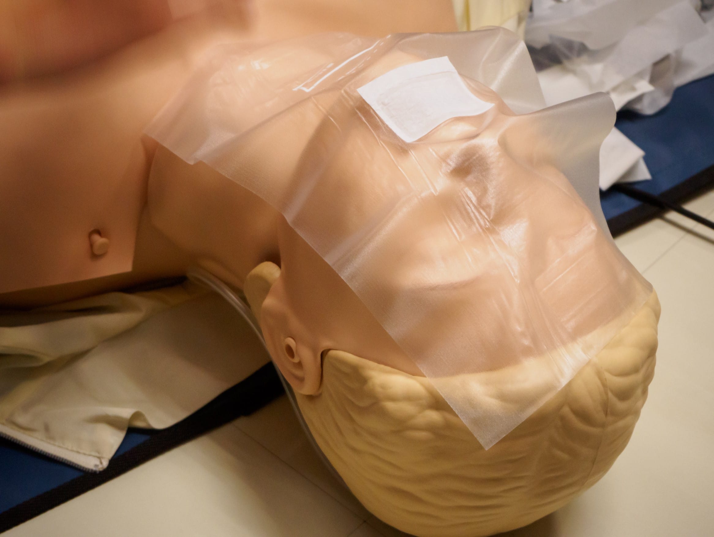 Close up of a medical mannequin with a disposable CPR Face Shield