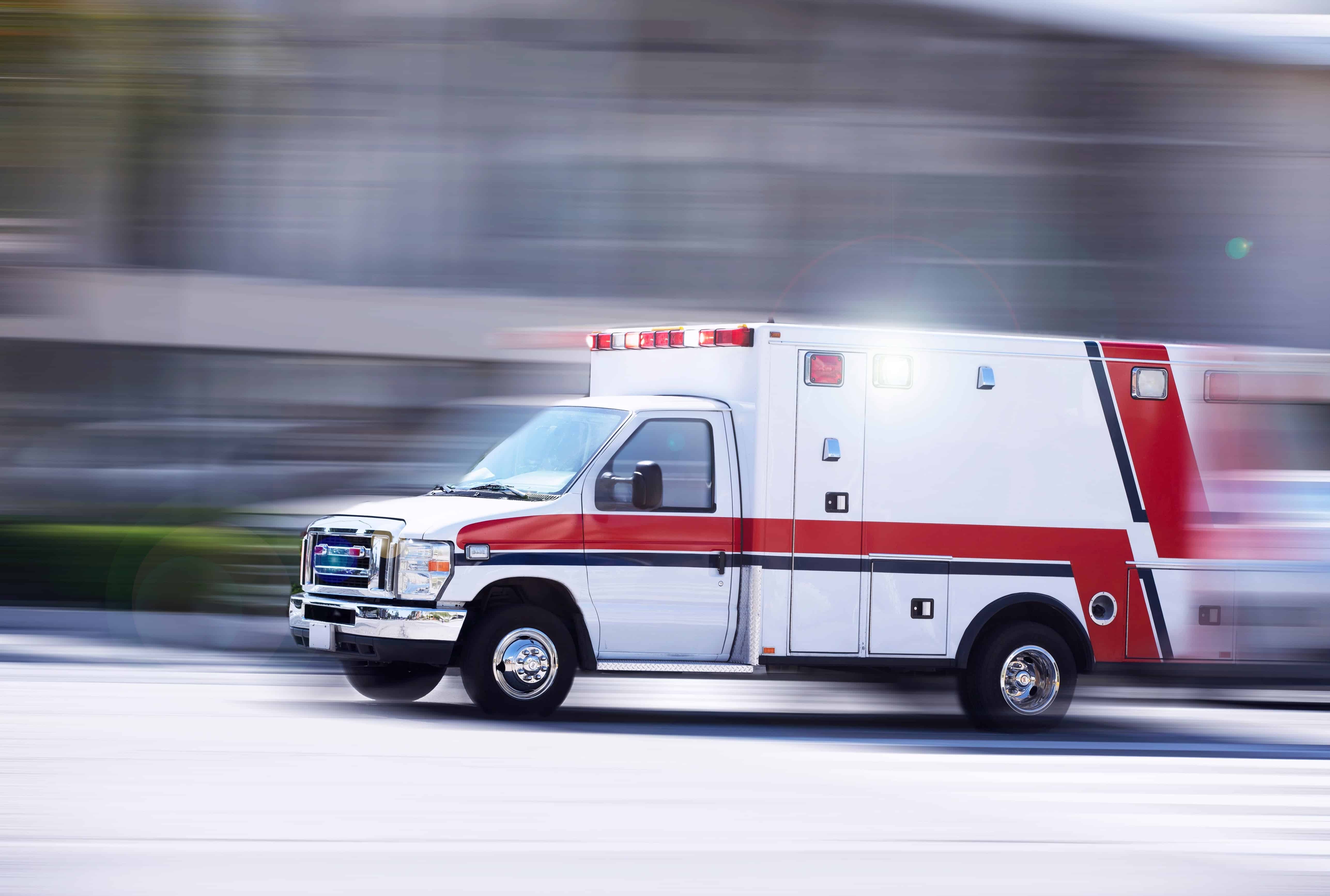Close up of a blurred ambulance in motion