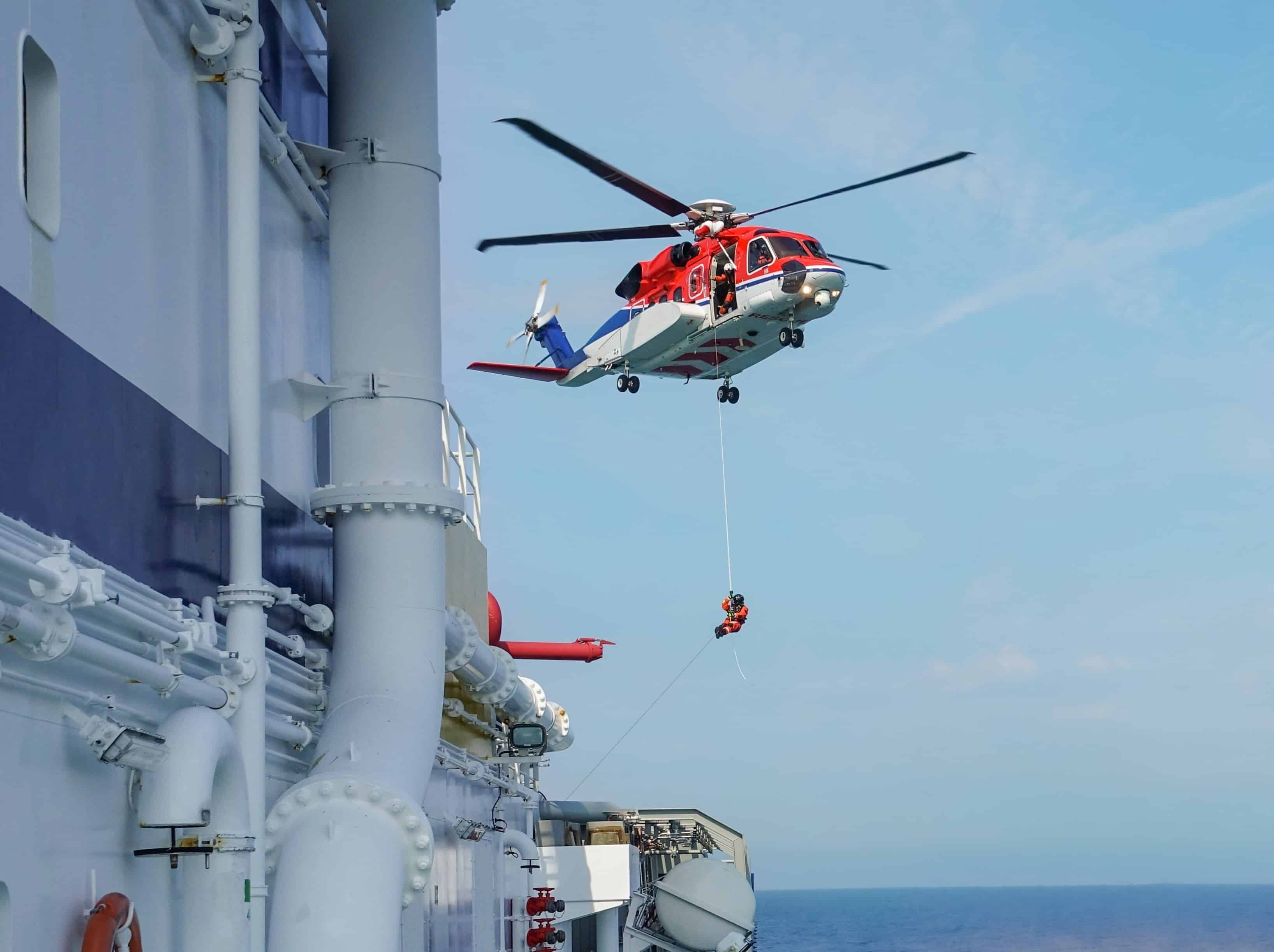 Search and rescue helicopter at sea
