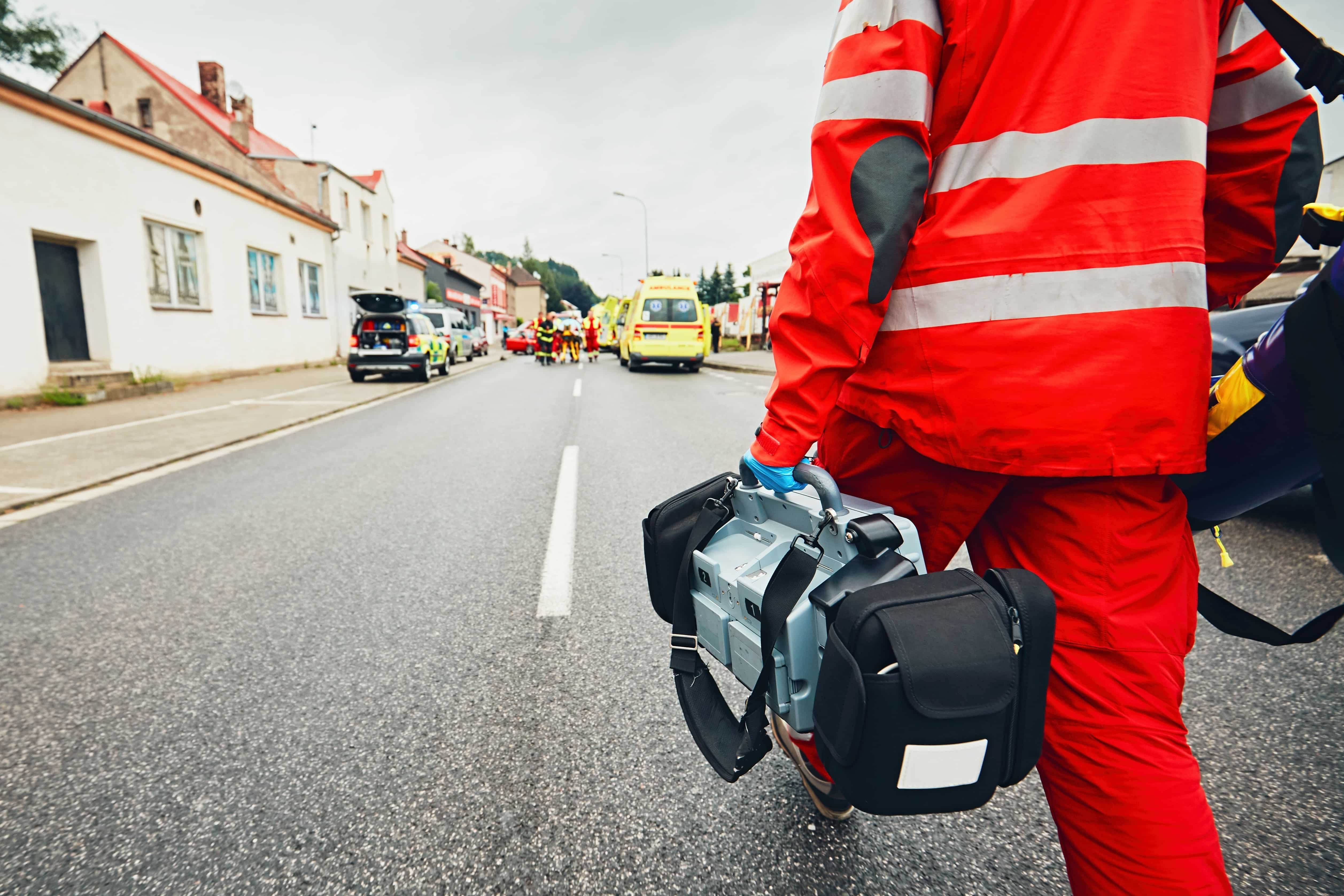 Close up of an EMS professional walking to a crash site