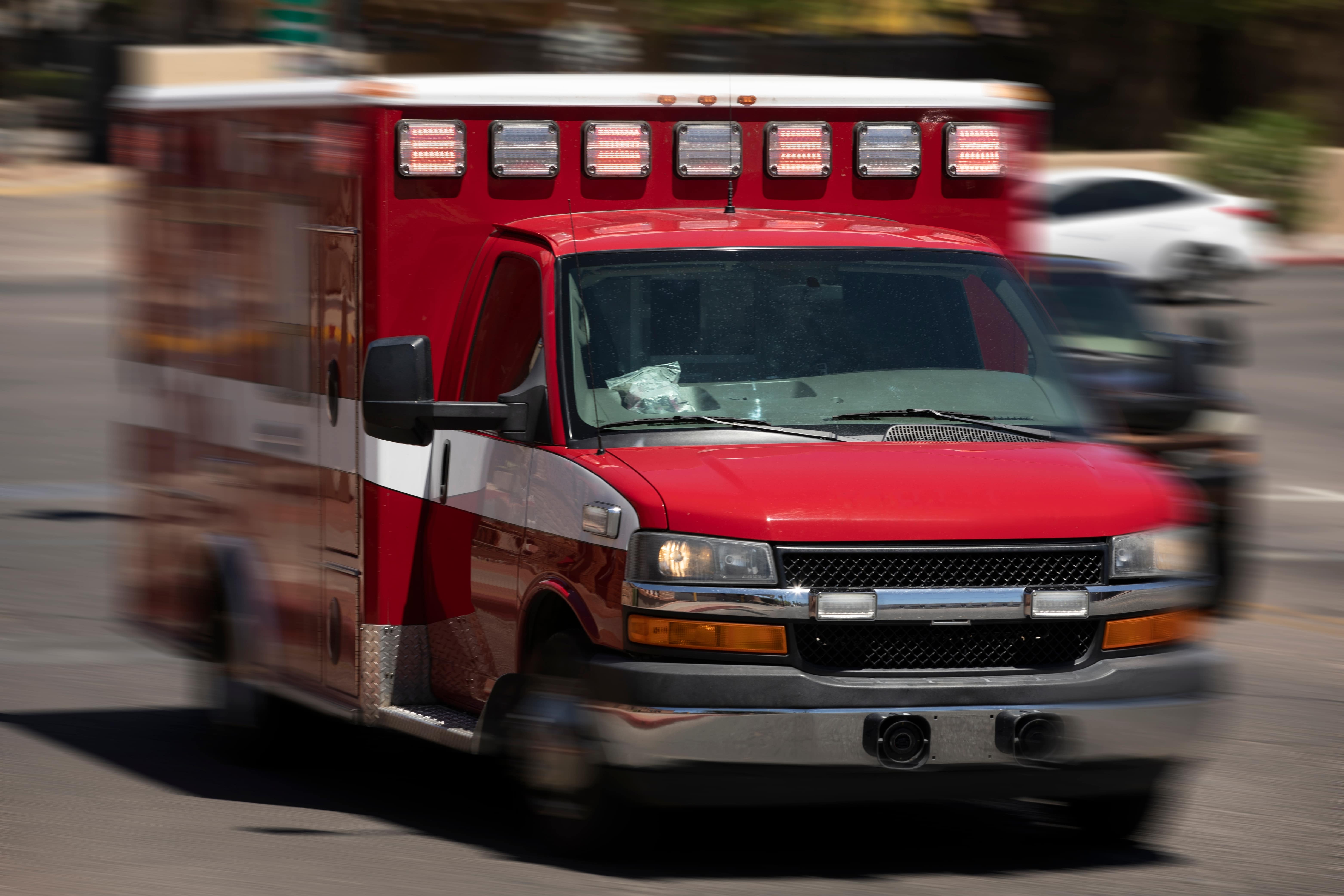 Blurred ambulance in motion racing to a call