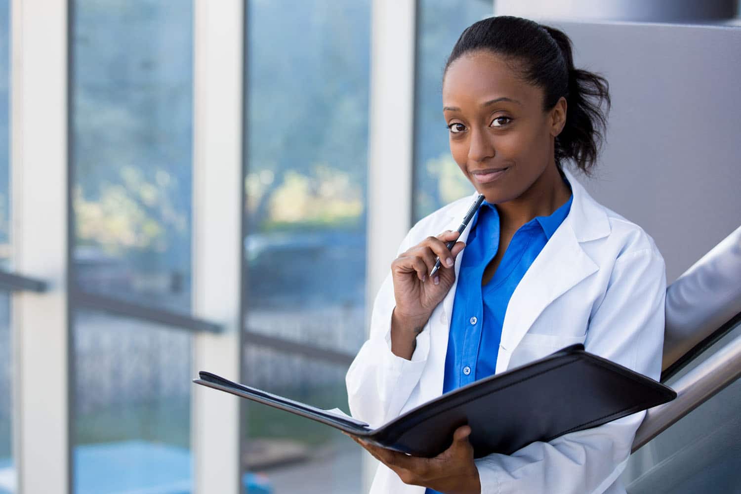 African-American medical professional standing in a hospital